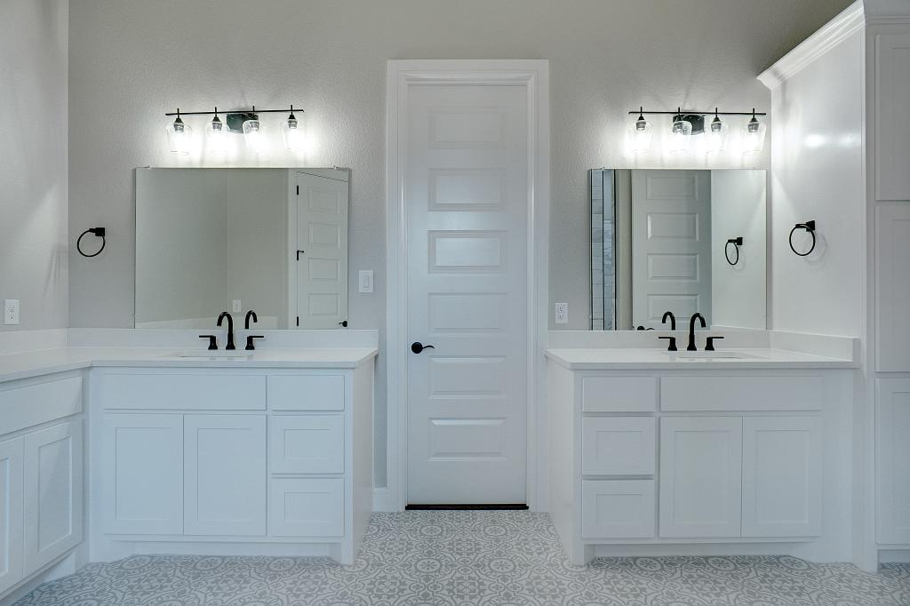 Custom bathroom cabinets by Living Stone Contruction