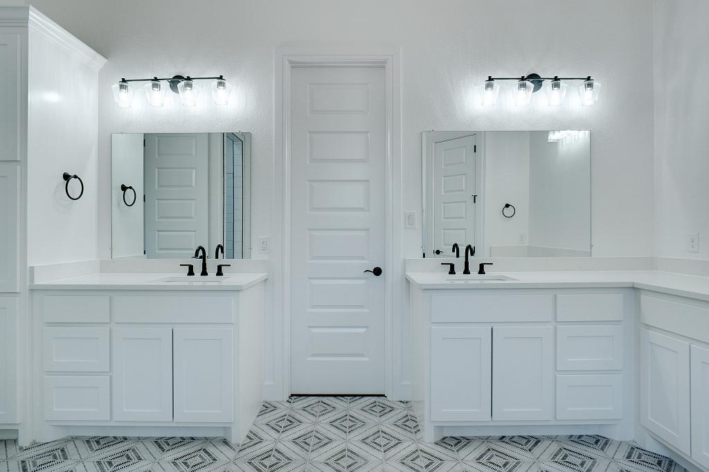 Custom bathroom cabinets by Living Stone Contruction