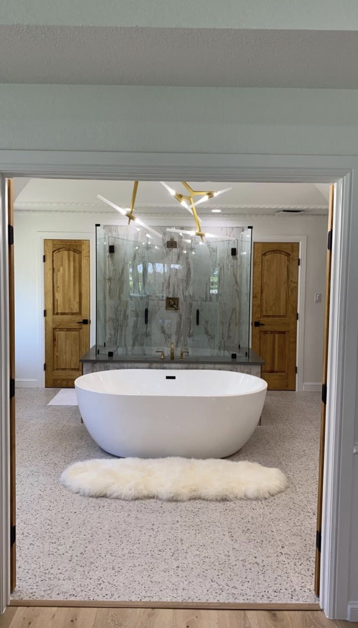 Custom bathroom remodel by Living Stone Construction