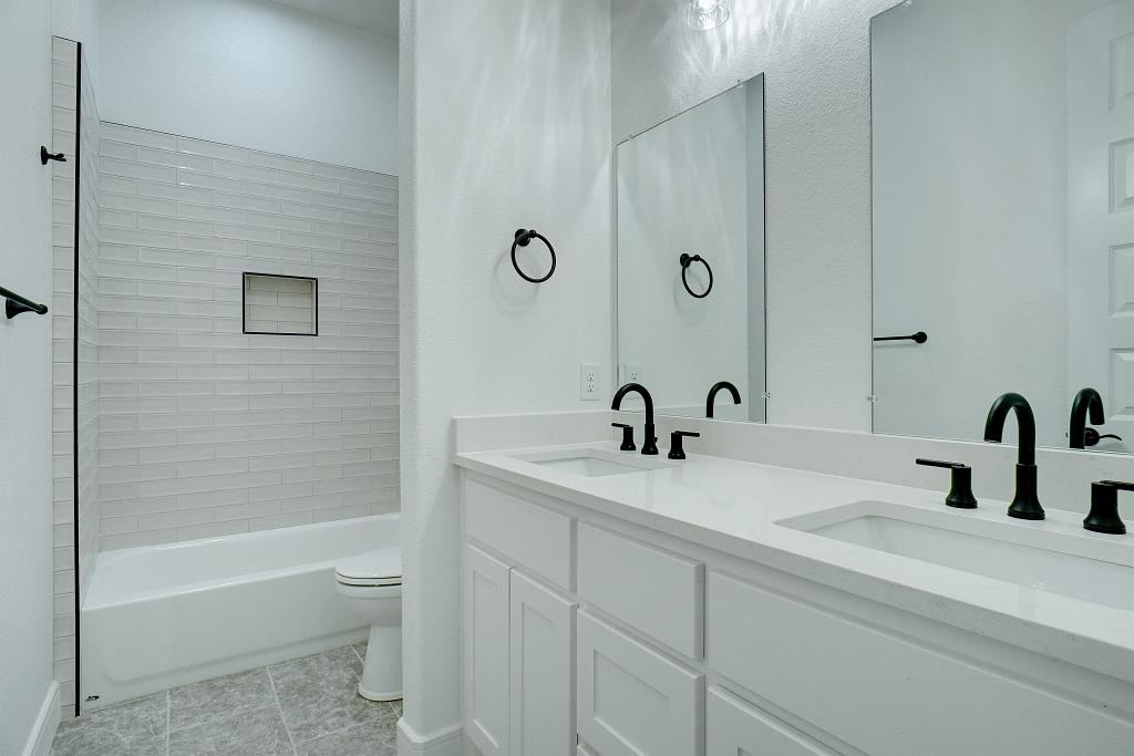 Custom bathroom cabinets by Living Stone Contruction