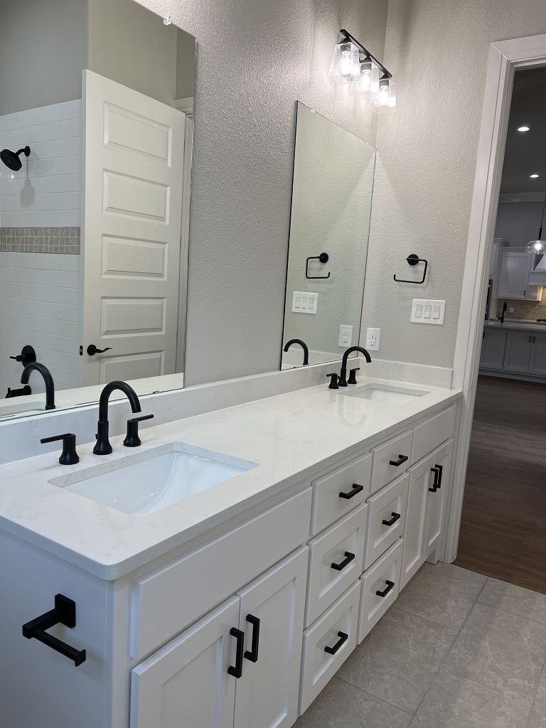 Custom bathroom cabinets by Living Stone Contruction